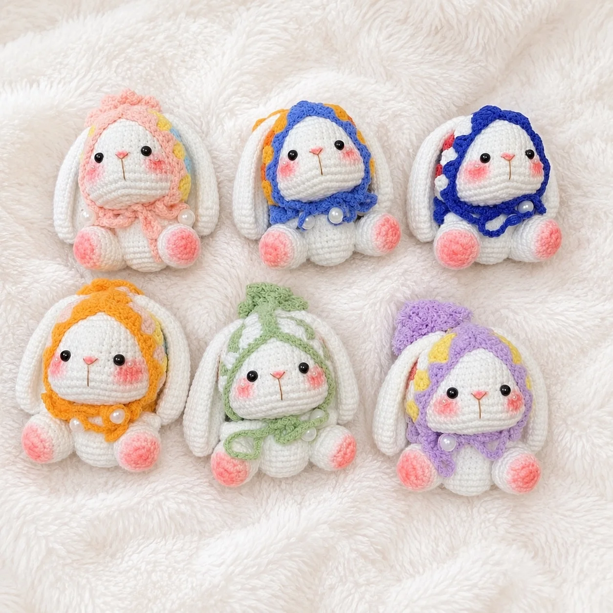 A gathering of six bonnet bunnies in different colours